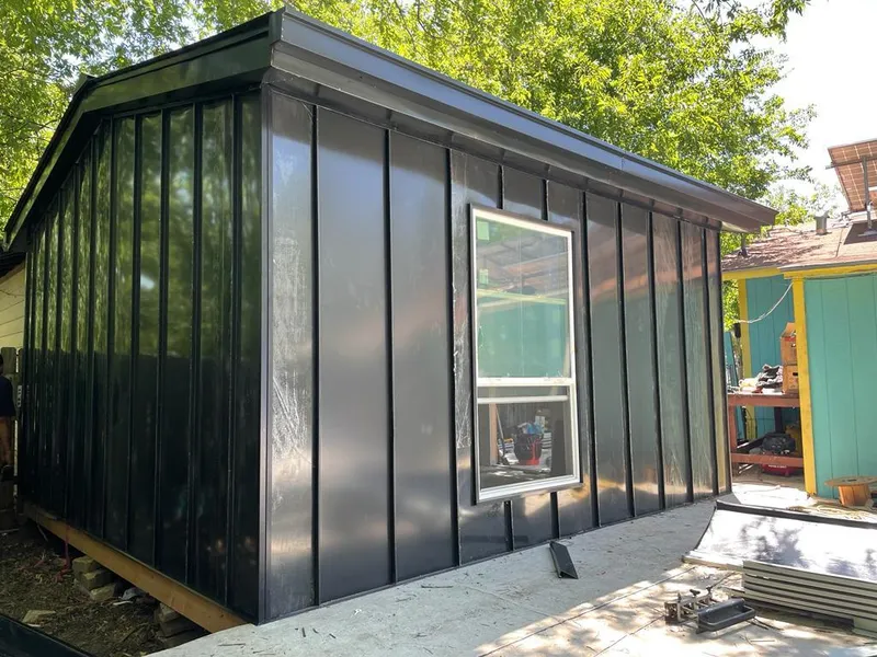 Black standing seam metal wall panels for Metal Roof Installation in Olympia