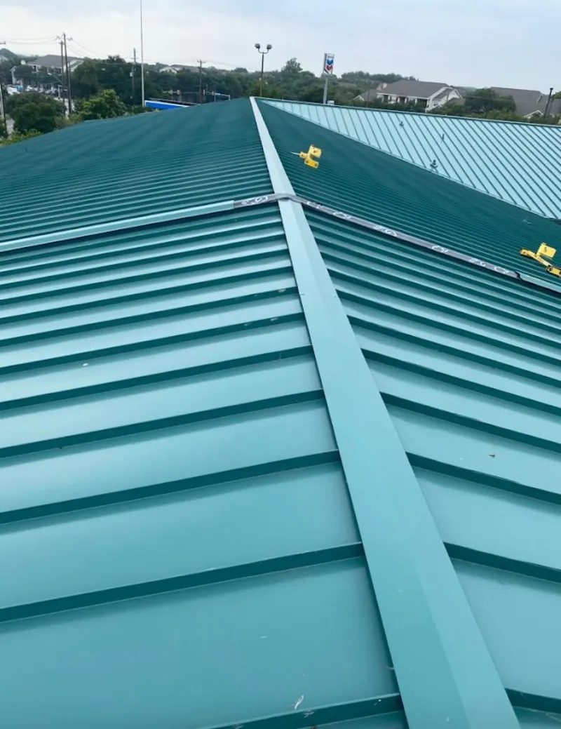 Green commercial metal roof ridge and valley for Metal Roof Repair in Olympia